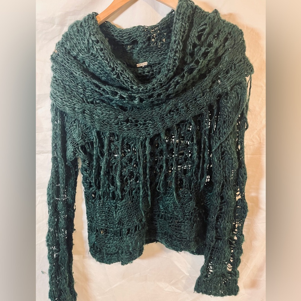 Free People - dark green sweater with fringe.